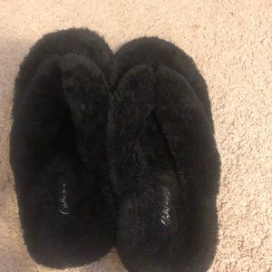 fluffy black flip flops